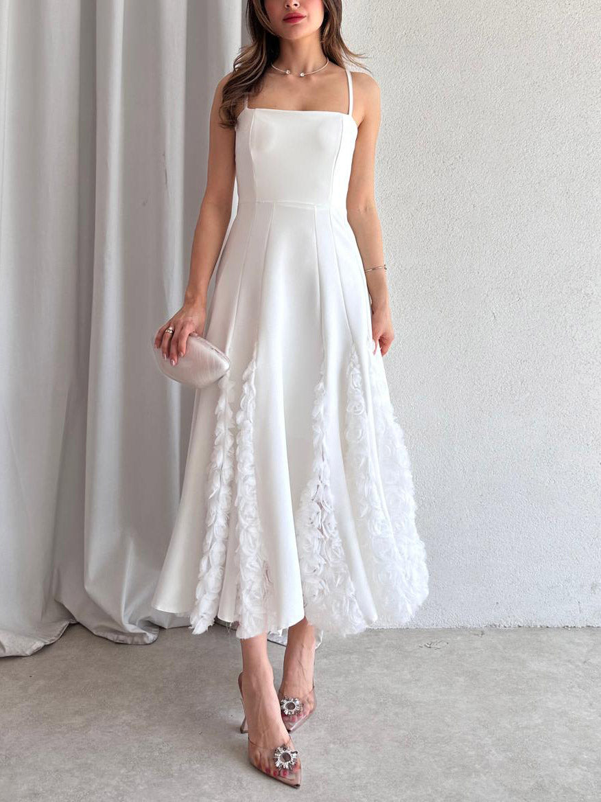 Robe mi-longue élégante à bretelles spaghetti et appliques florales roses
