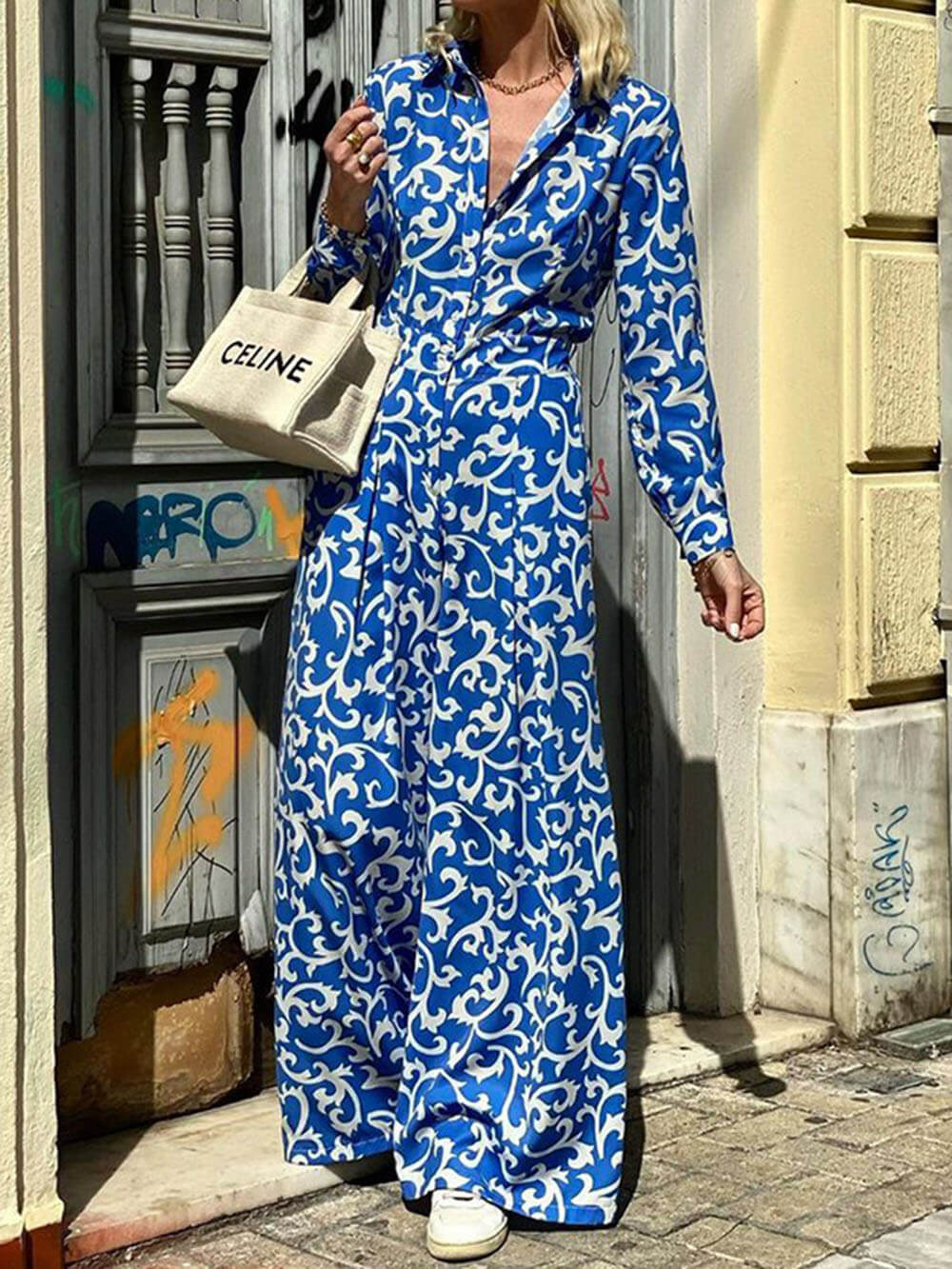 Robe mi-longue à imprimé tendance et taille à revers