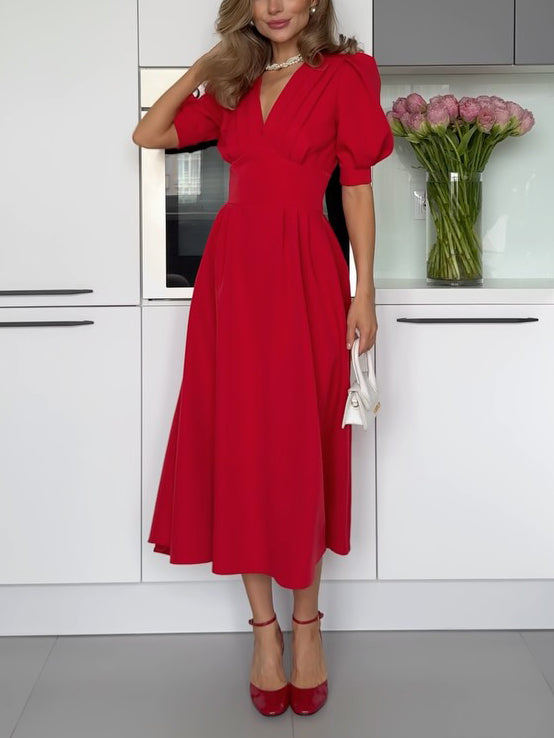 Robe mi-longue élégante à col en V et manches courtes bouffantes