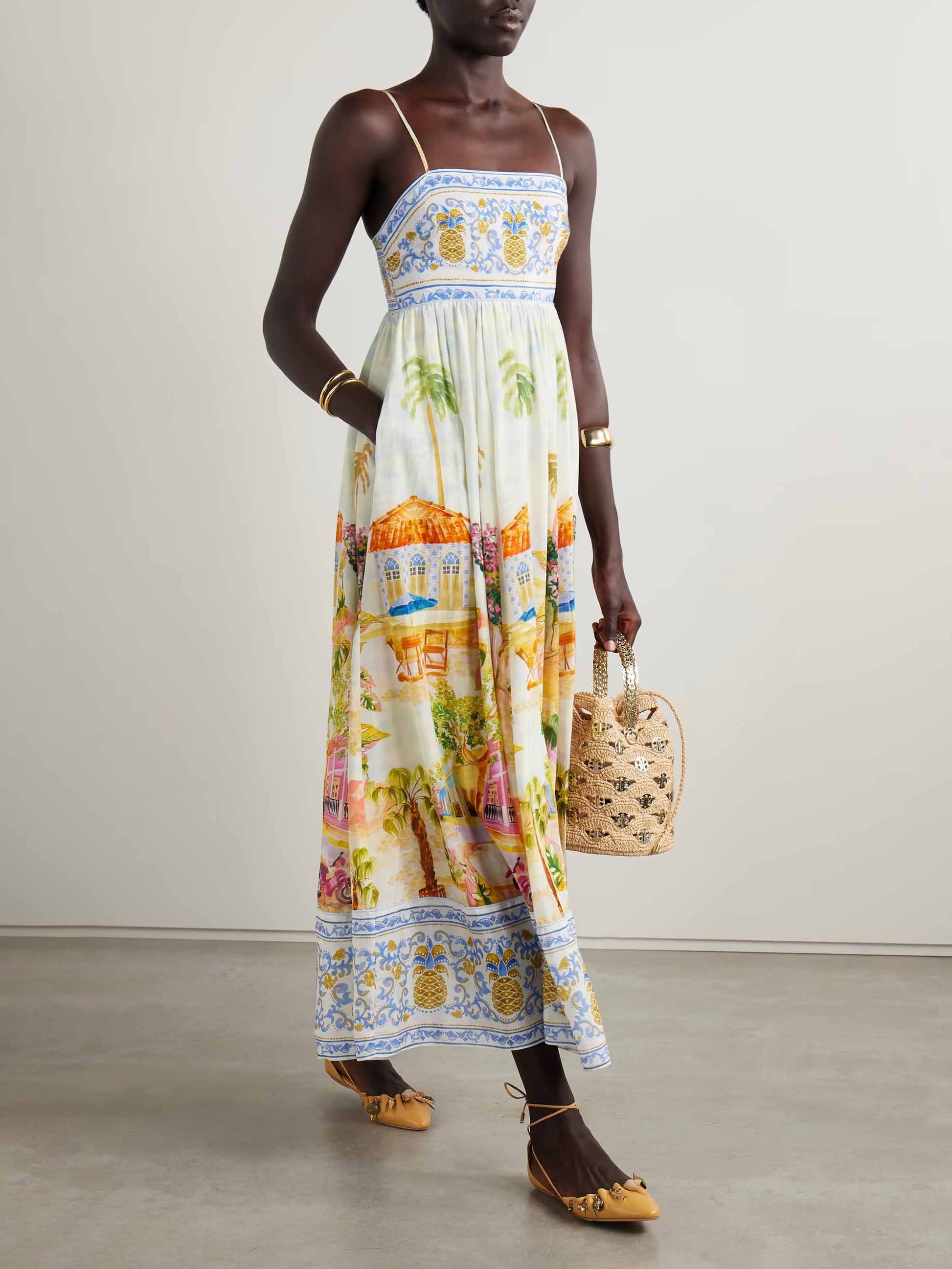 Robe longue à bretelles unique à imprimé peint pour les fêtes