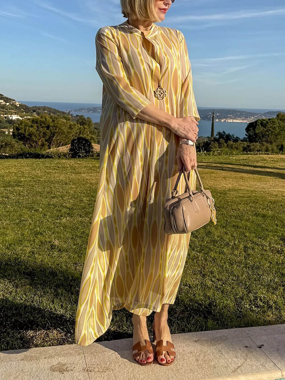 Robe longue décontractée et sans effort à col en V et imprimé pour les vacances