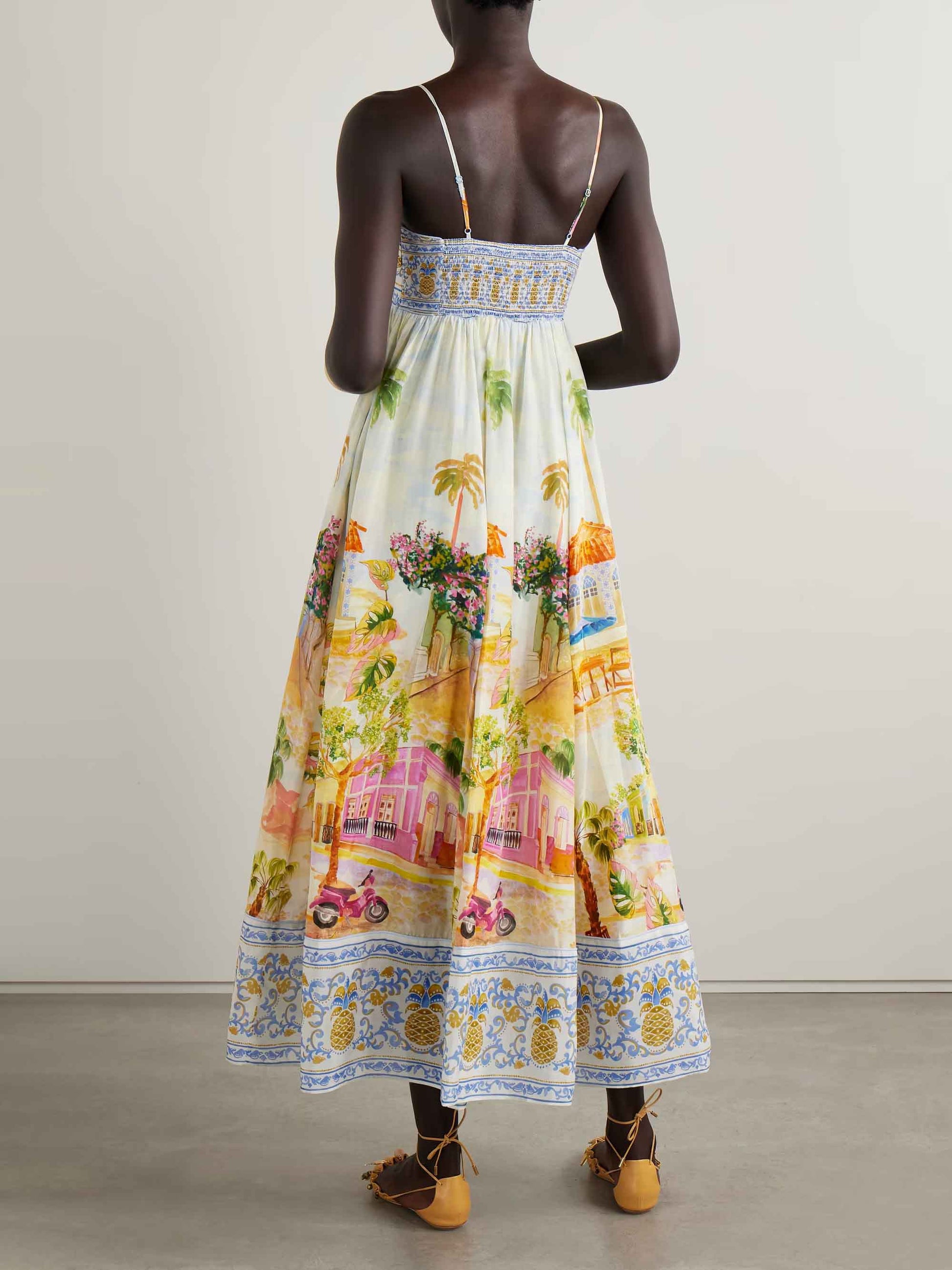 Robe longue à bretelles unique à imprimé peint pour les fêtes