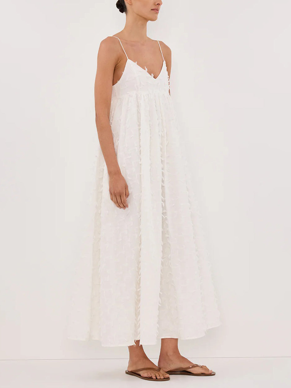 Robe midi élégante à col en V et petits pompons