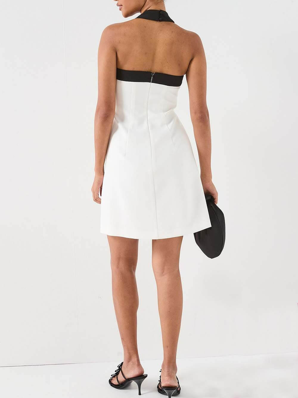 Mini-robe élégante avec nœud mono