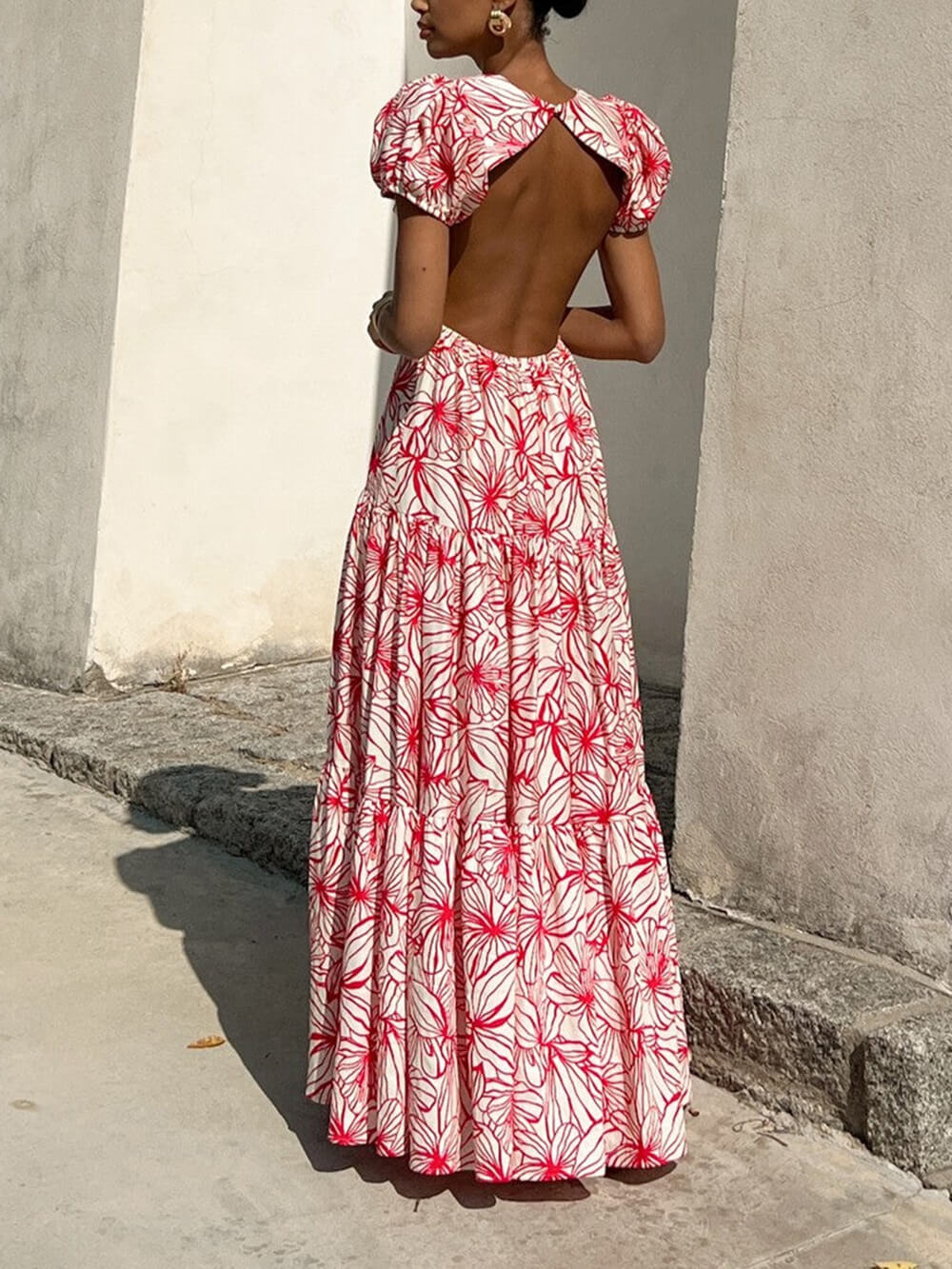 Magnifique robe longue plissée à imprimé floral et dos ouvert
