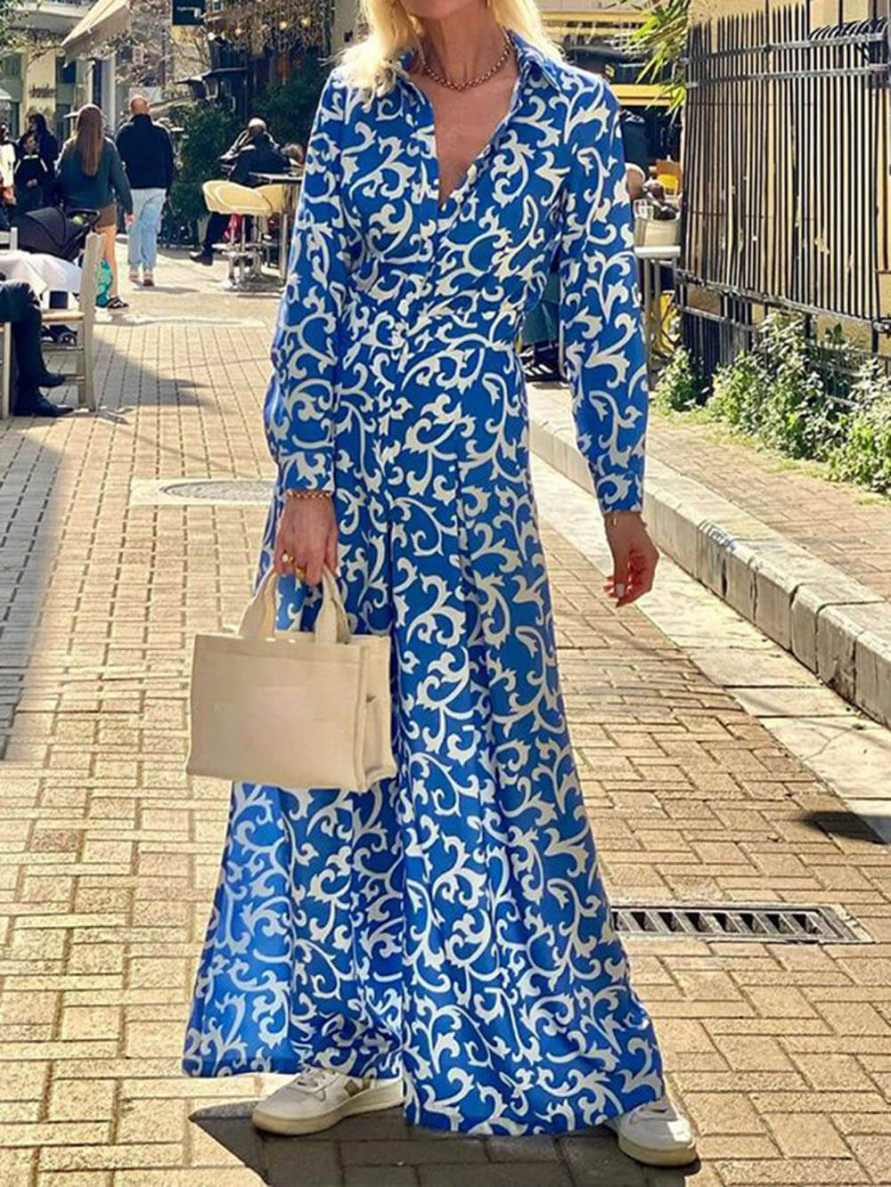Robe mi-longue à imprimé tendance et taille à revers