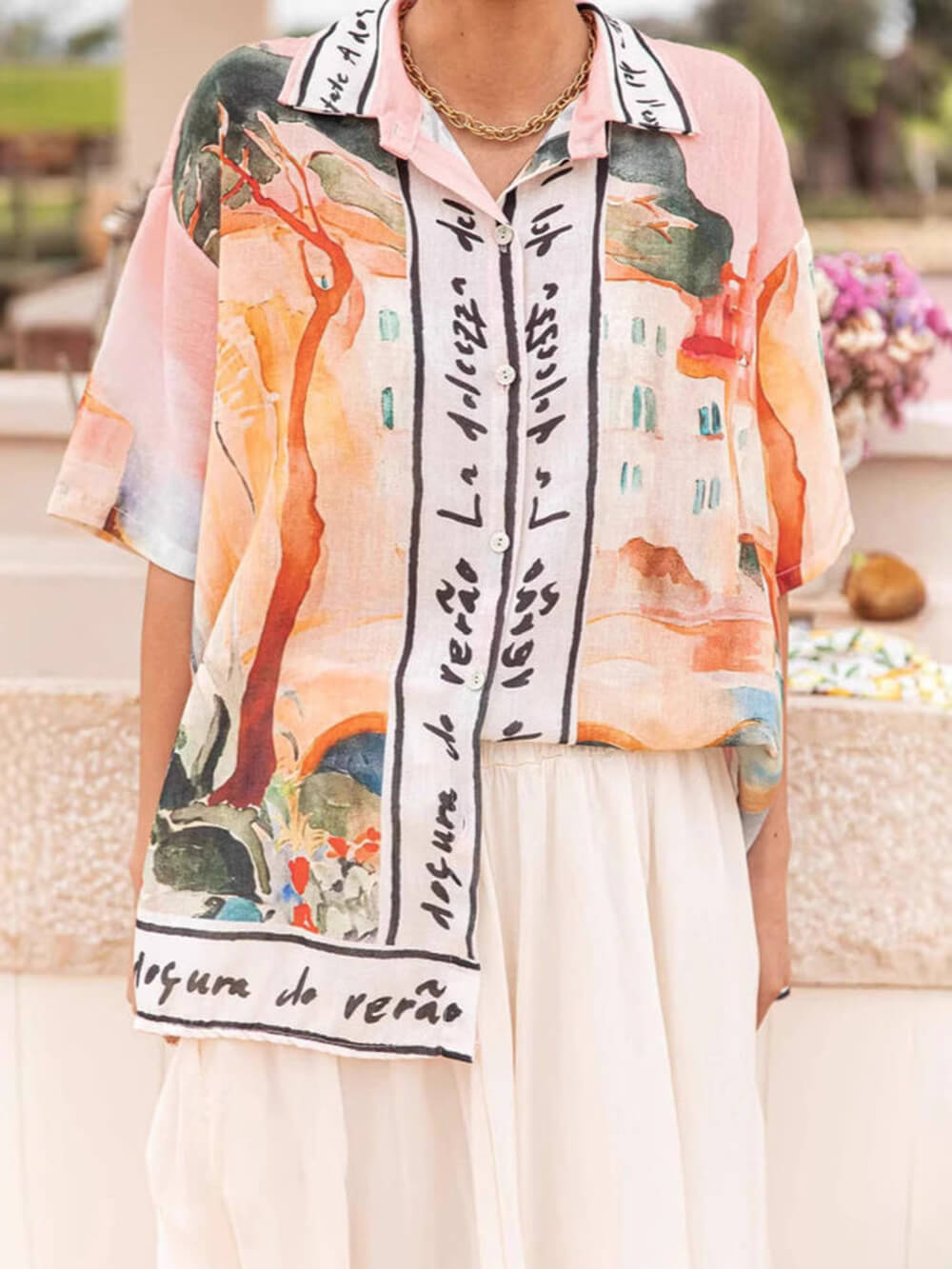 Chemise oversize boutonnée à manches courtes et revers imprimés, style décontracté et unique