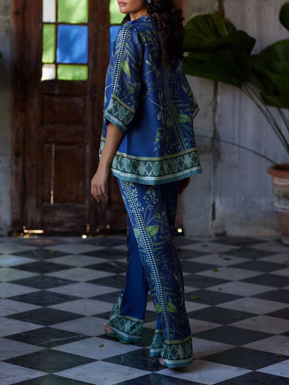 Ocean Elegance – Lockere Hose mit weitem Bein und botanischem Druck und elastischer Taille