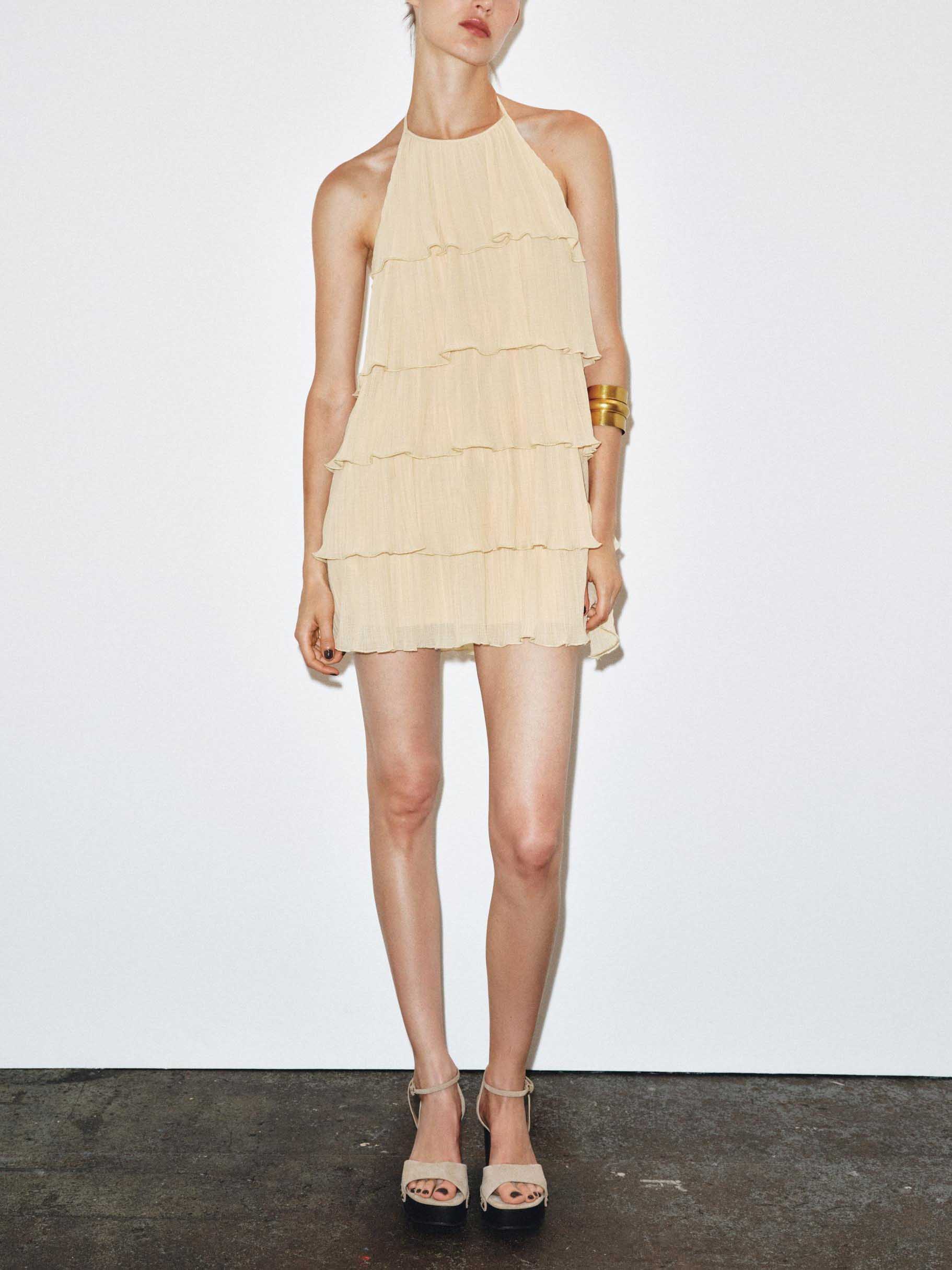 Robe mini élégante à volants et dos nu