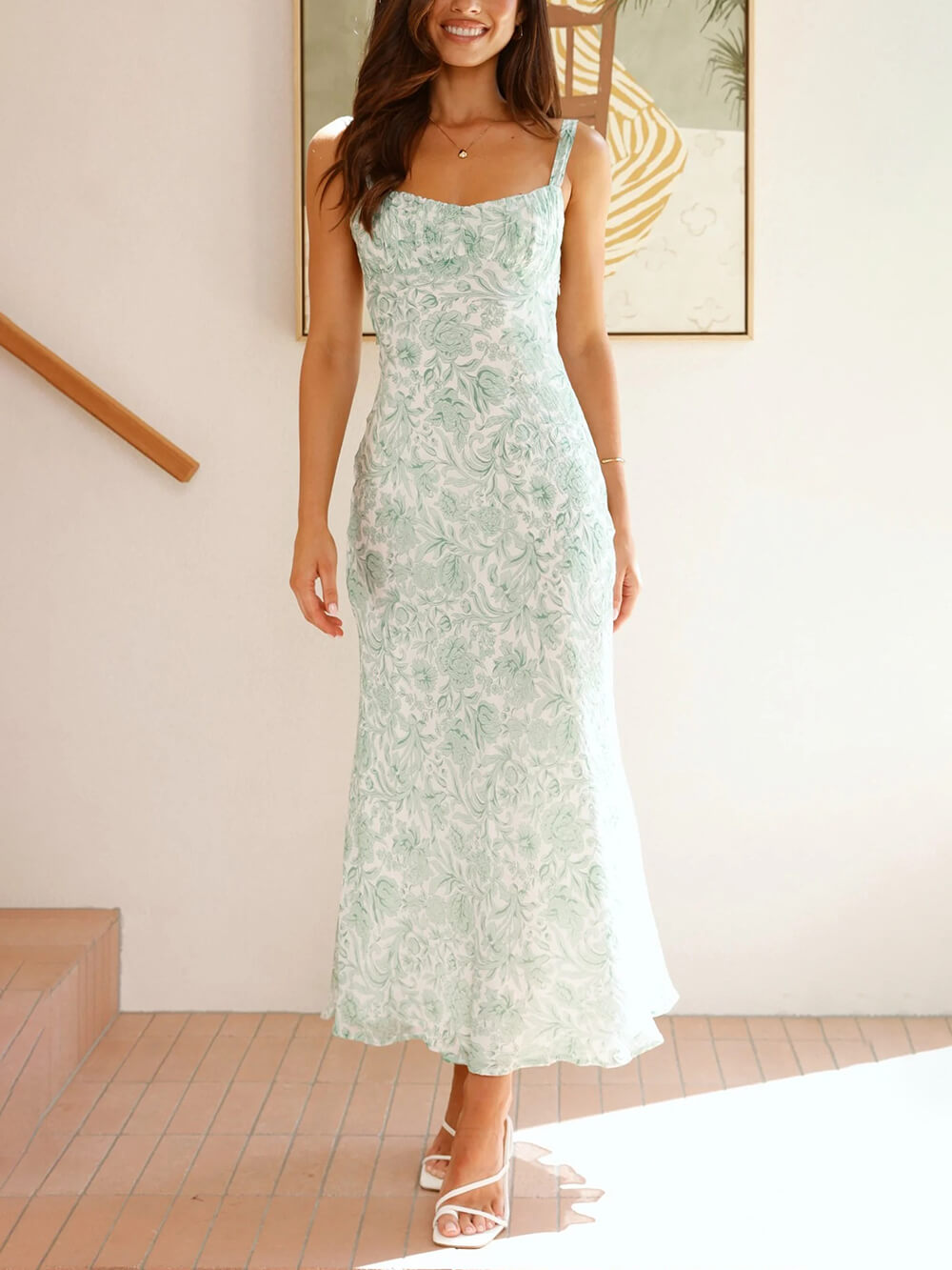Robe midi plissée à imprimé floral sophistiqué et dos ouvert