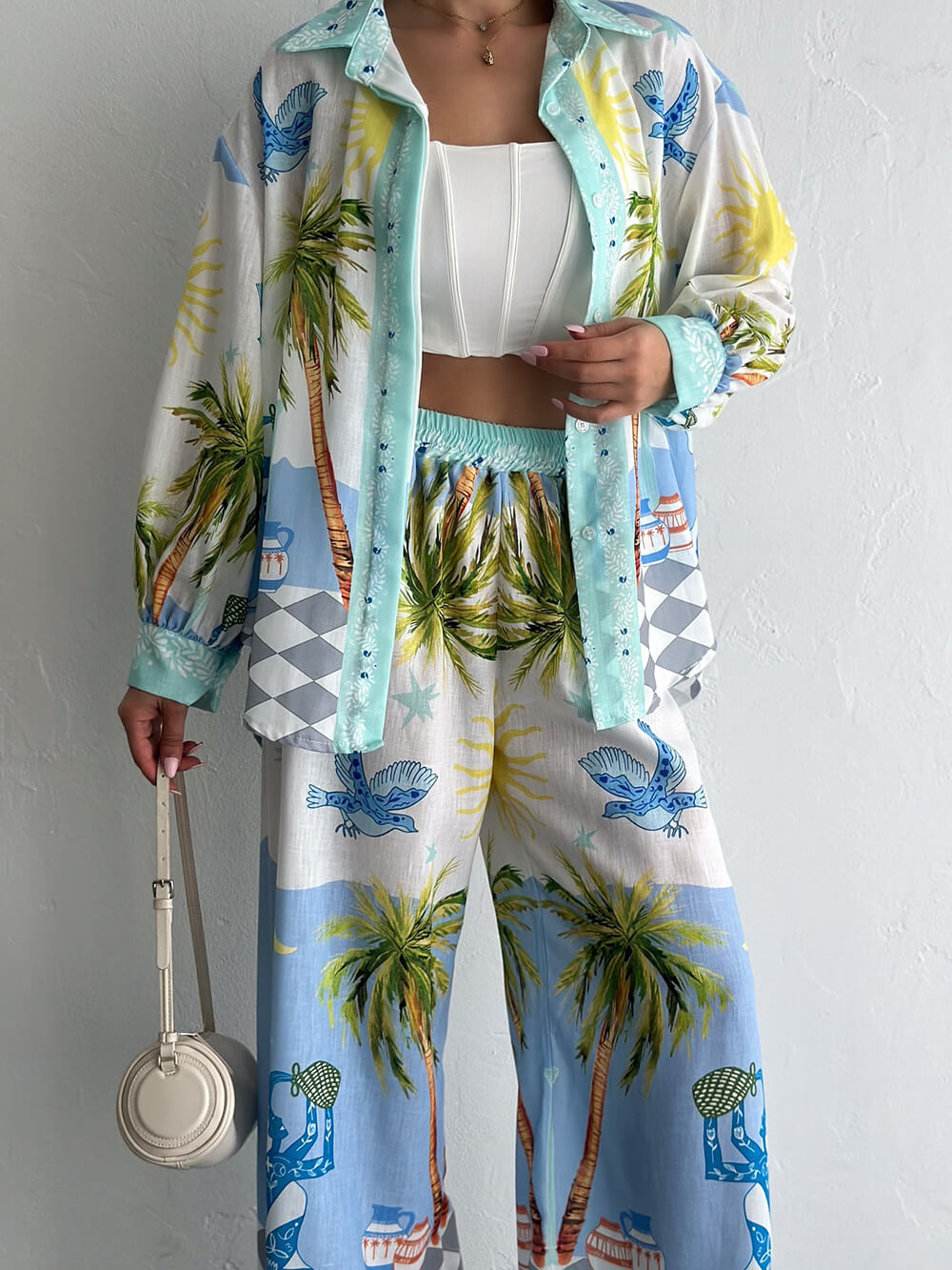 Chemise ample boutonnée surdimensionnée à imprimé palmiers en bord de mer
