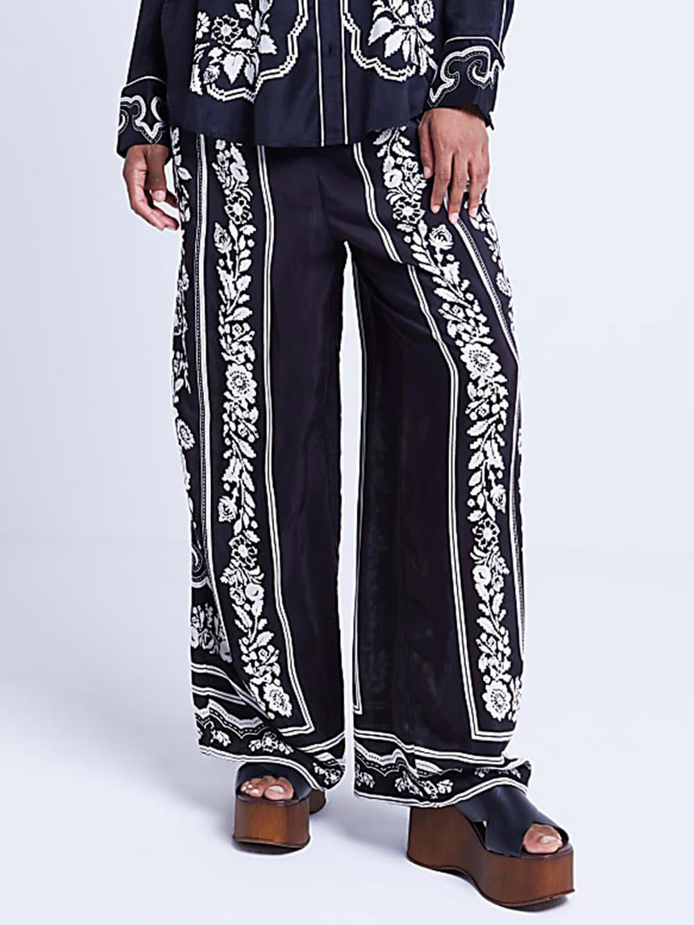 Einzigartige Hose mit weitem Bein und elastischer Tasche im Western-Blumenmuster