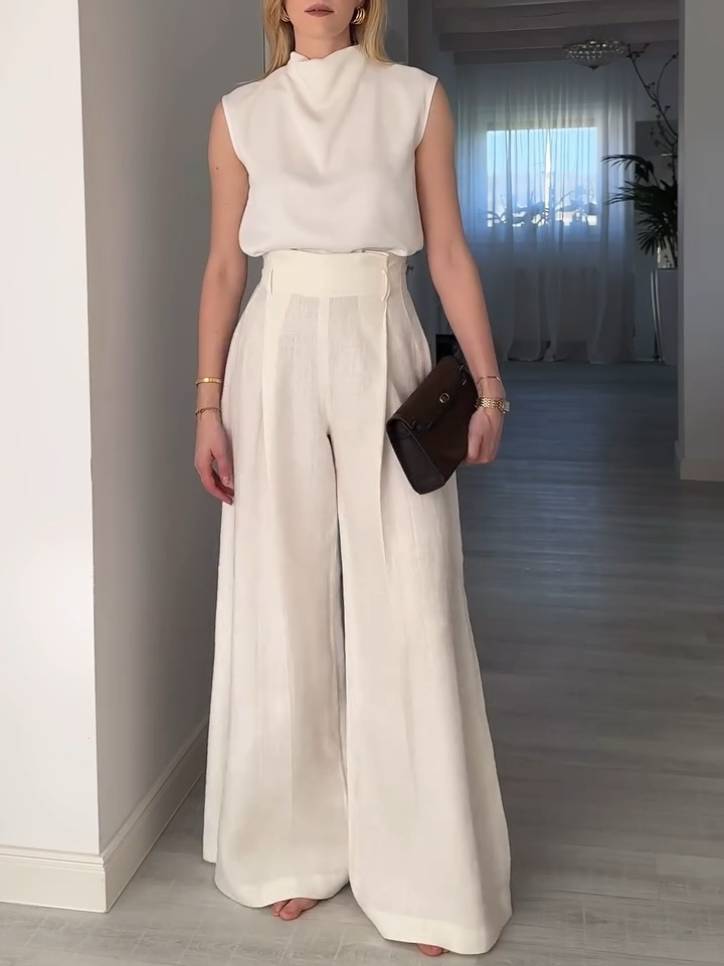 Elegantes, minimalistisches, ärmelloses Hemd mit mittlerem Kragen