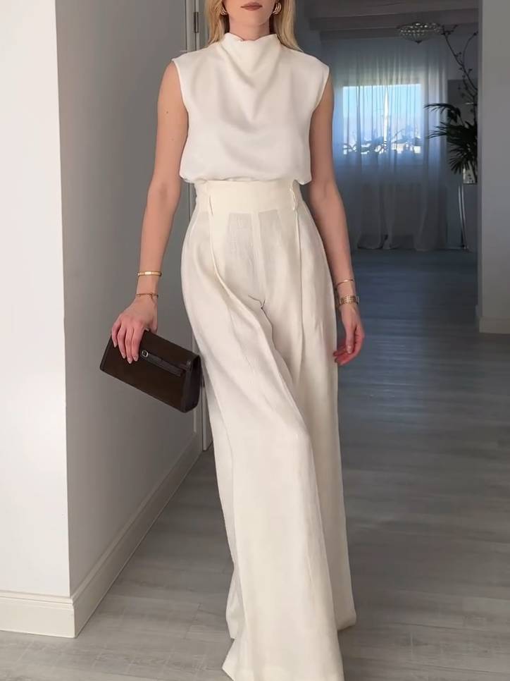 Elegantes, minimalistisches, ärmelloses Hemd mit mittlerem Kragen