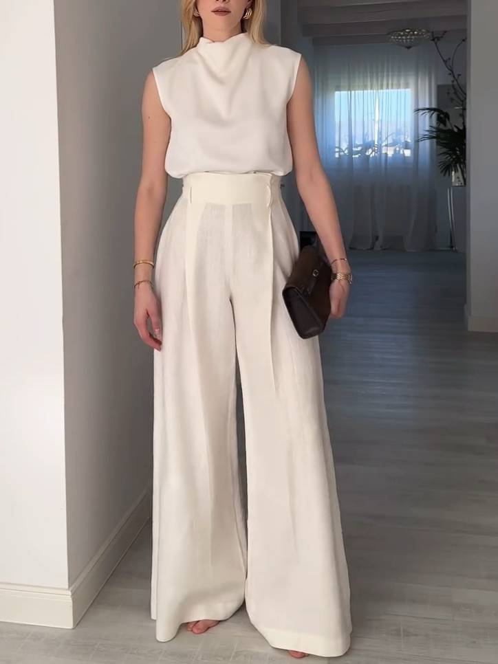 Elegantes, minimalistisches, ärmelloses Hemd mit mittlerem Kragen