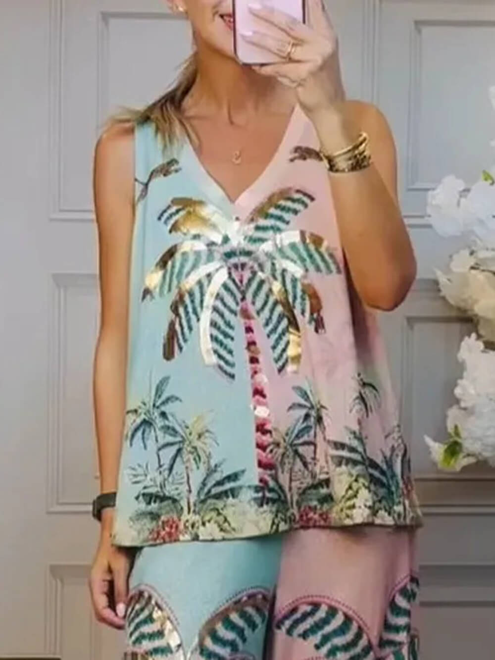 Einzigartige, lockere Hose mit weitem Bein und elastischer Taille mit Palmenmuster