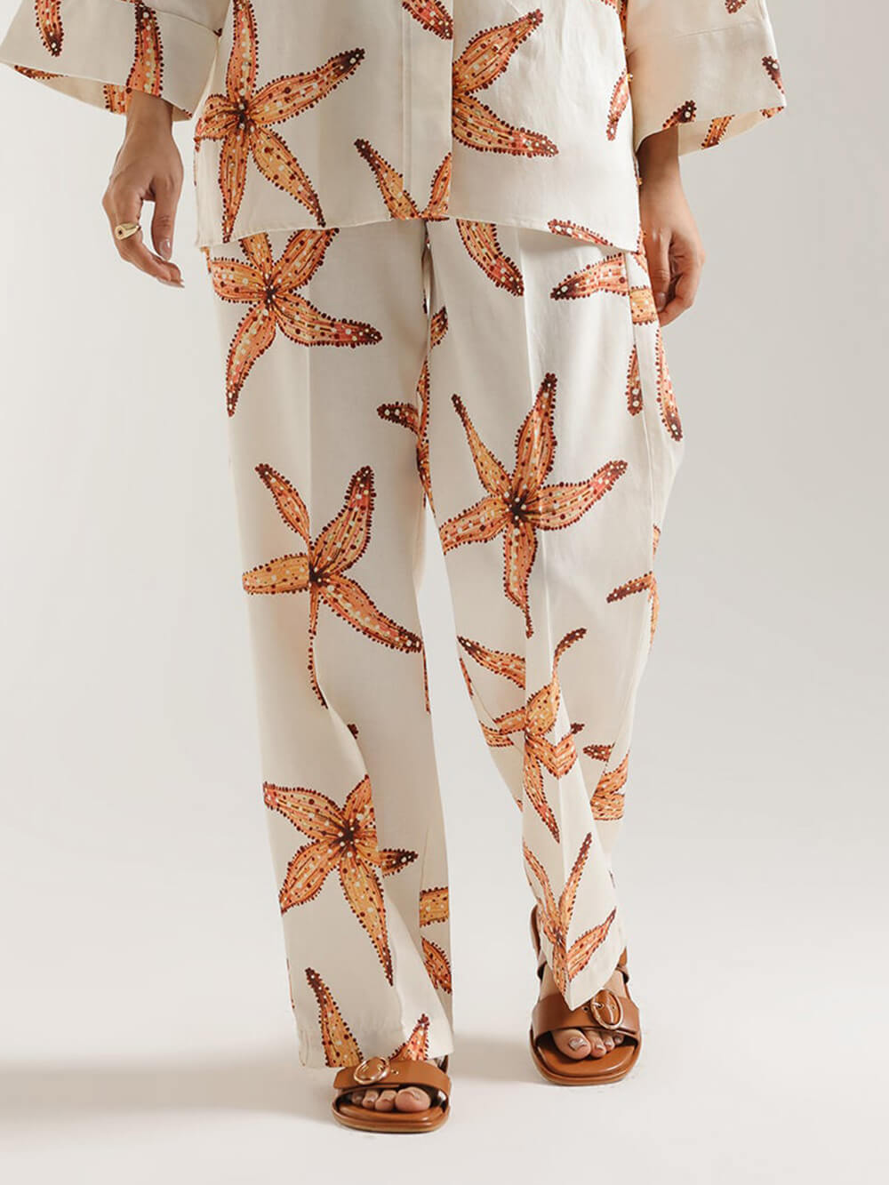 Einzigartige, lockere, gerade Hose mit Taschen und Seestern-Print
