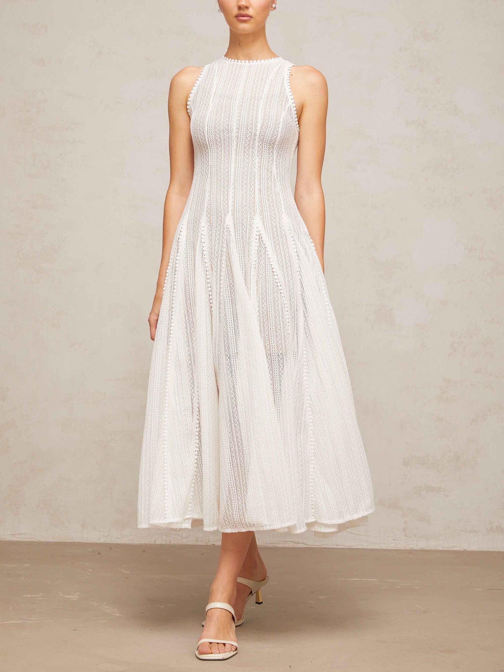 Robe mi-longue trapèze élégante en dentelle creuse sans manches