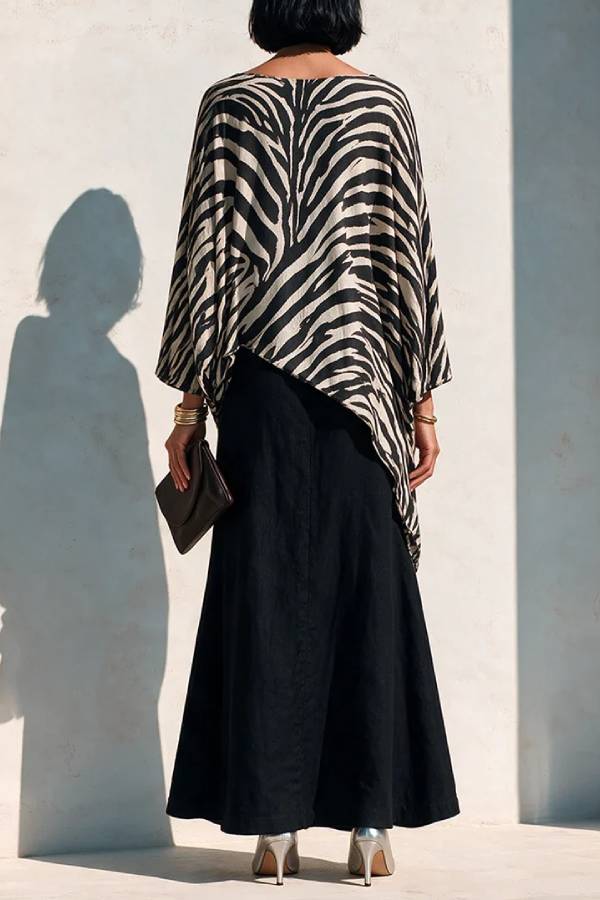 Black Zebra Asymmetrical Top And Black Drape Skirt Two‑Piece Set