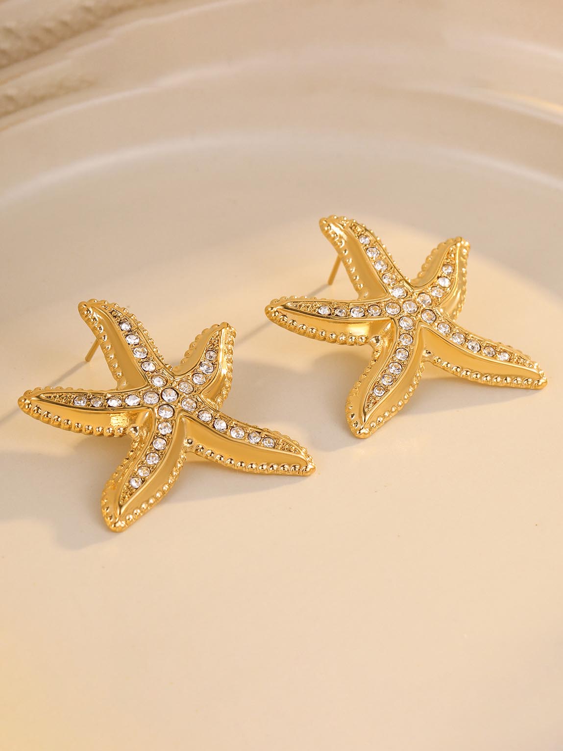 Boucles d'oreilles en zircon micro-incrusté d'étoiles de mer assorties