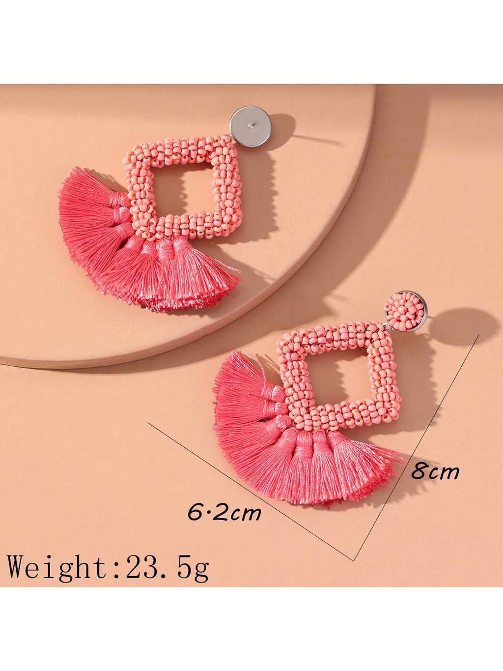 Boucles d'oreilles à pompons tissées à la main