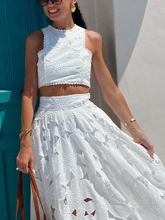 Elegantes kurzes Tanktop mit hohler Blumenspitze