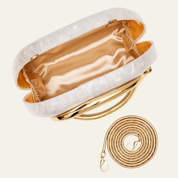 The Capri Sculptural Handle Clutch
