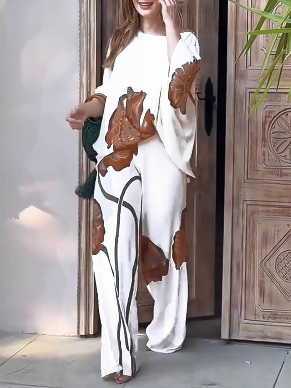 Haut ample à manches chauve-souris et imprimé floral rétro