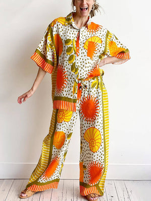 Lässiges, einzigartiges Satin-Sonnendruck-Lose-Button-Down-Übergröße-Hemd