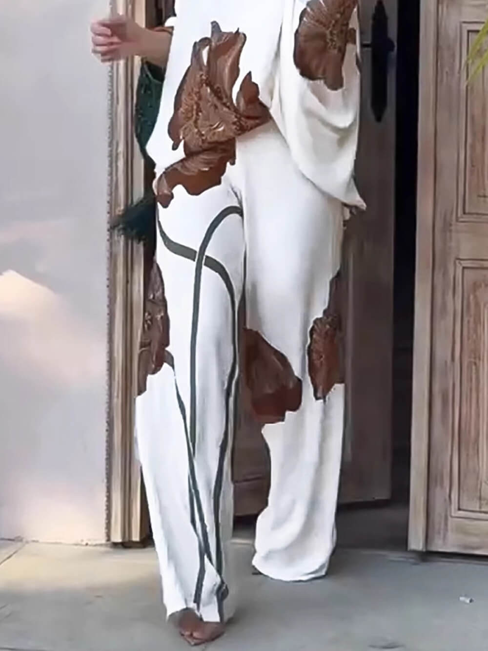 Haut ample à manches chauve-souris et imprimé floral rétro