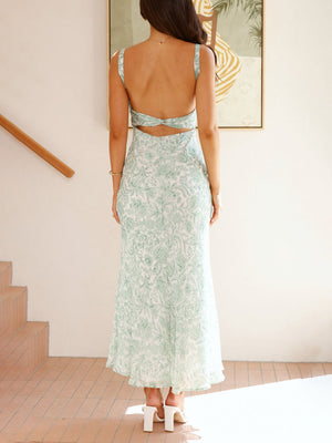 Robe midi plissée à imprimé floral sophistiqué et dos ouvert