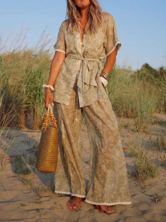 Chemisier élégant à manches courtes et boutons noués à la taille