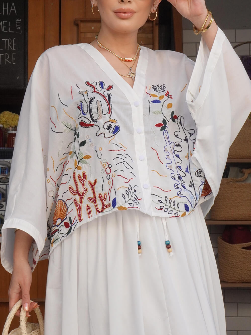 Jupe élégante à taille élastique avec imprimé brodé et lien ample