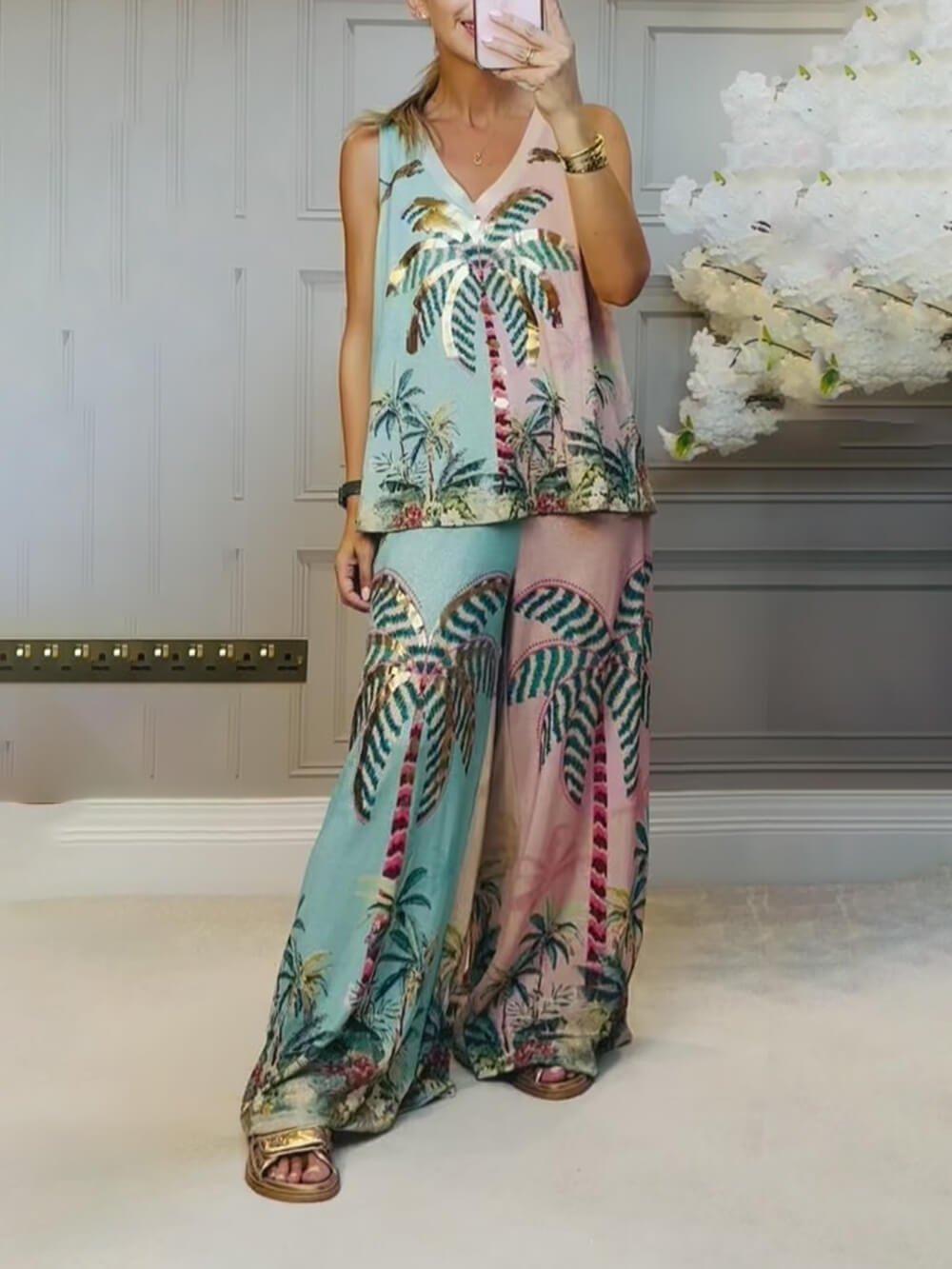 Einzigartige, lockere Hose mit weitem Bein und elastischer Taille mit Palmenmuster