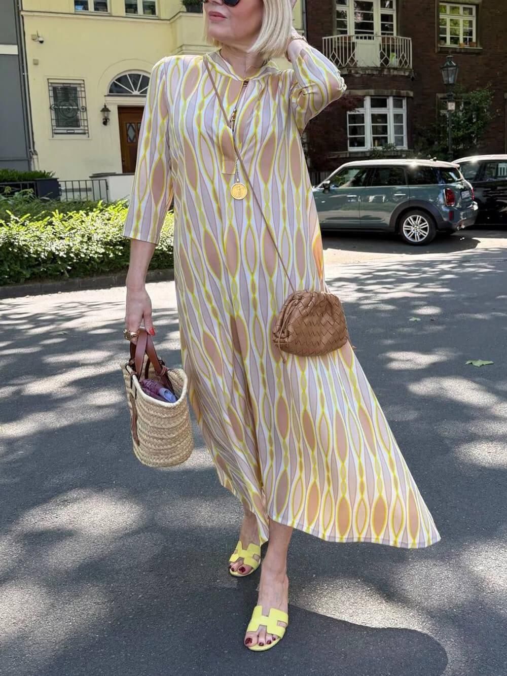 Robe longue décontractée et sans effort à col en V et imprimé pour les vacances