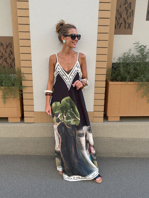 Robe longue à bretelles unique à imprimé floral d'encre