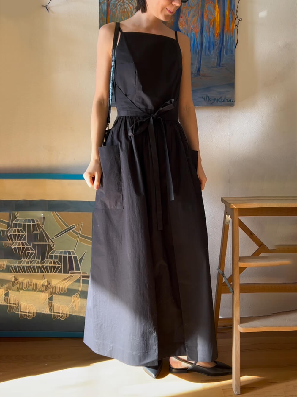 Robe gilet unique à poches et lacets fendus sur le côté