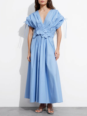 Robe mi-longue à appliques florales