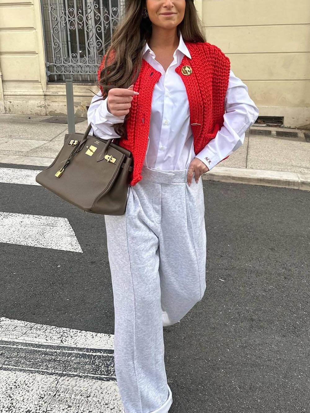 Elegante, ärmellose, kurze Strickjacke mit Tasche
