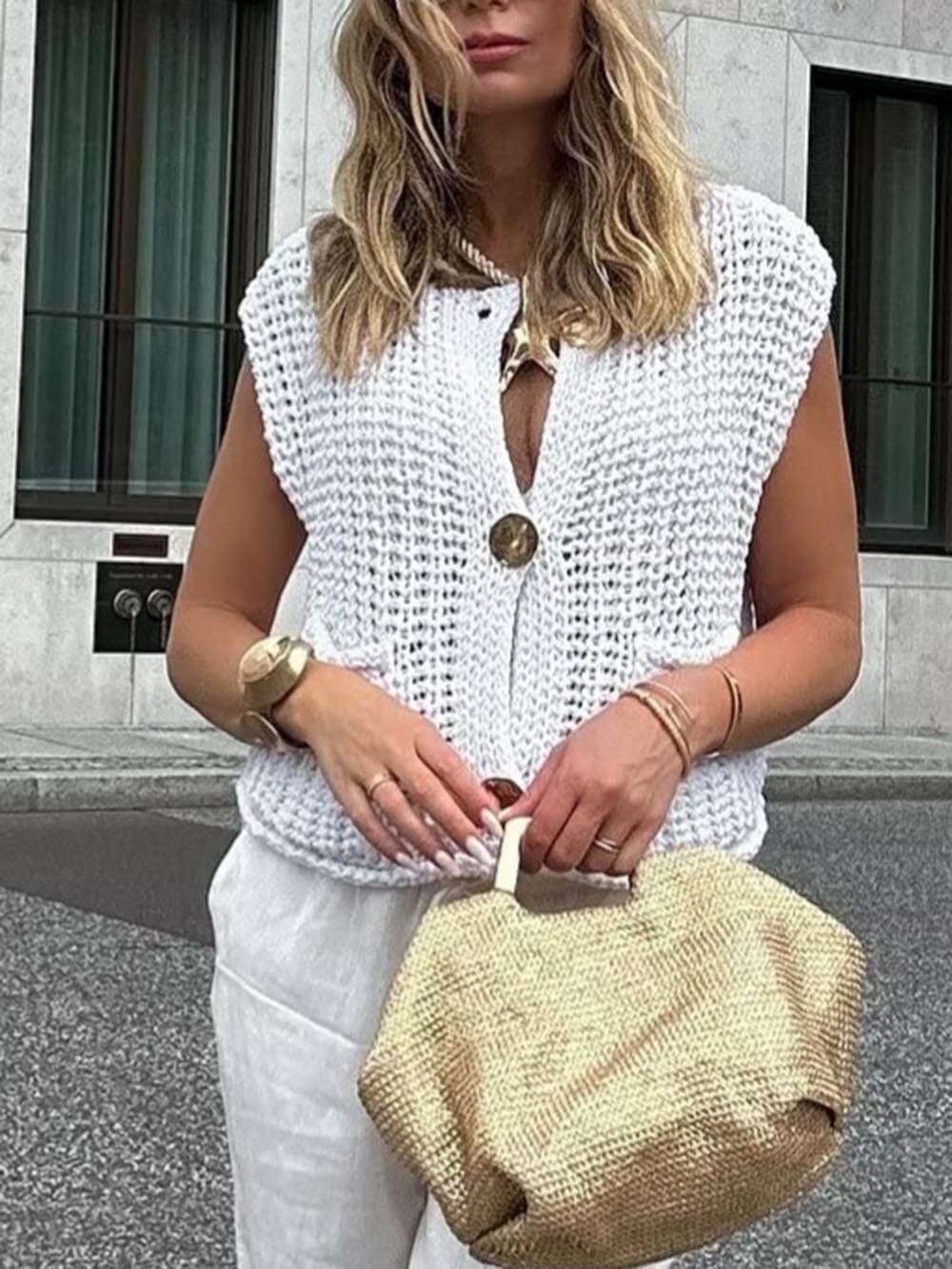 Elegante, ärmellose, kurze Strickjacke mit Tasche