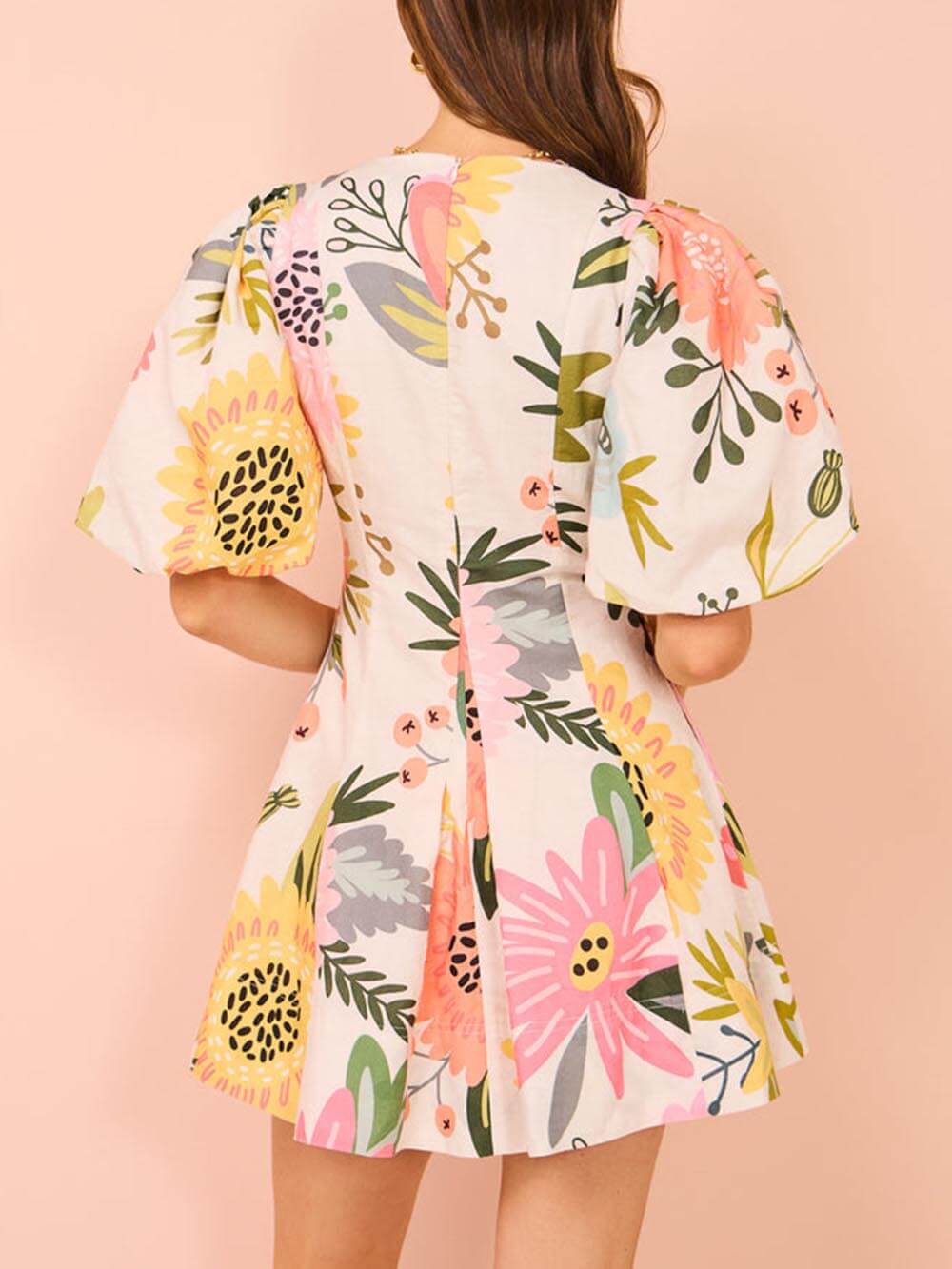 Mini-robe à manches bouffantes et poches à imprimé floral