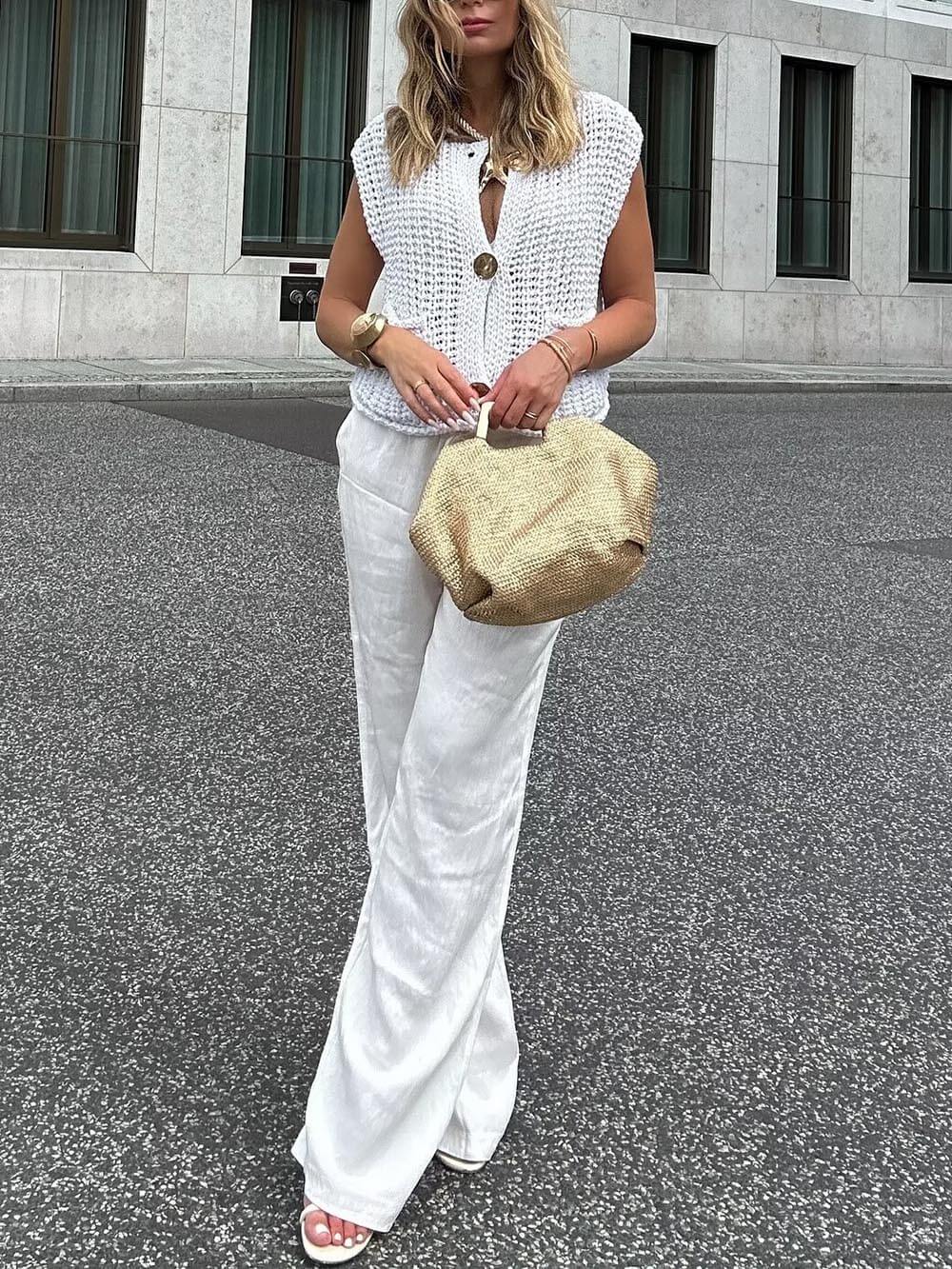 Elegante, ärmellose, kurze Strickjacke mit Tasche