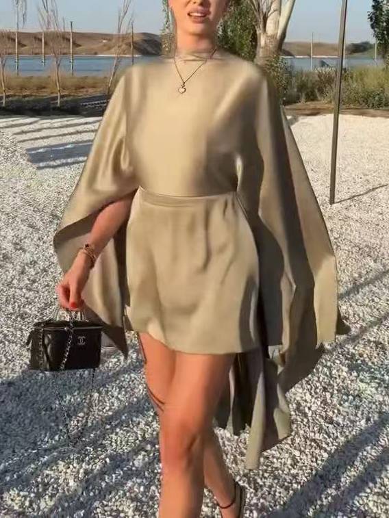 Elegantes Cape-Minikleid