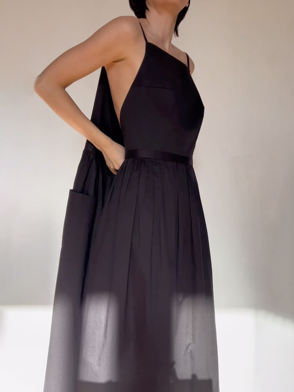 Robe gilet unique à poches et lacets fendus sur le côté
