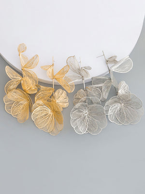 Boucles d'oreilles à fleurs creuses exagérées au design rétro