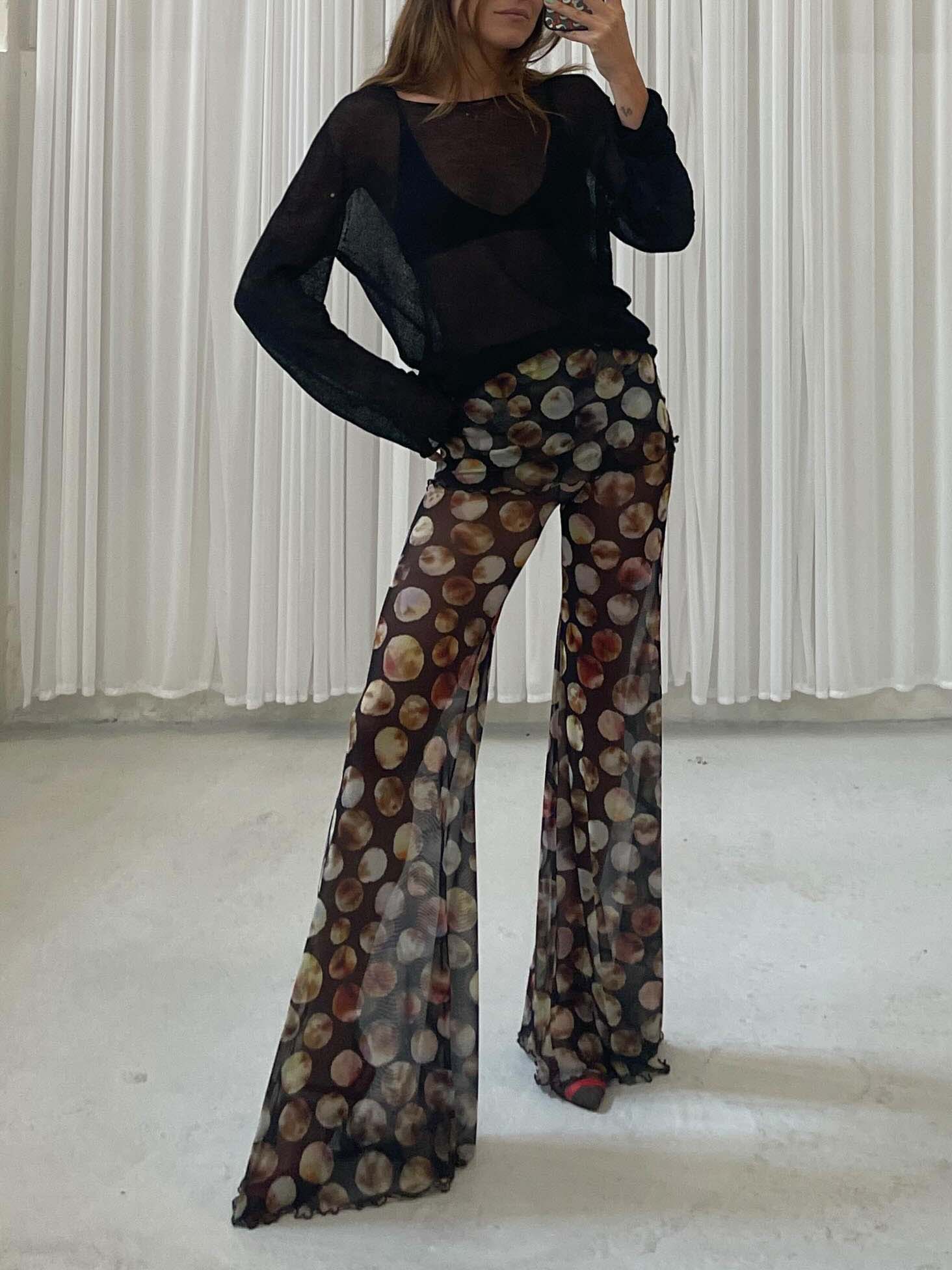 Pantalon évasé taille haute à imprimé maille exquis