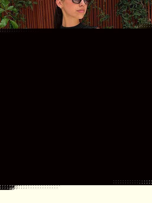 Ärmelloses Strickkleid mit Quastensaum