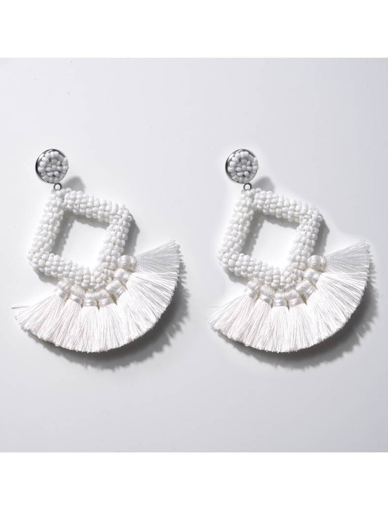 Boucles d'oreilles à pompons tissées à la main