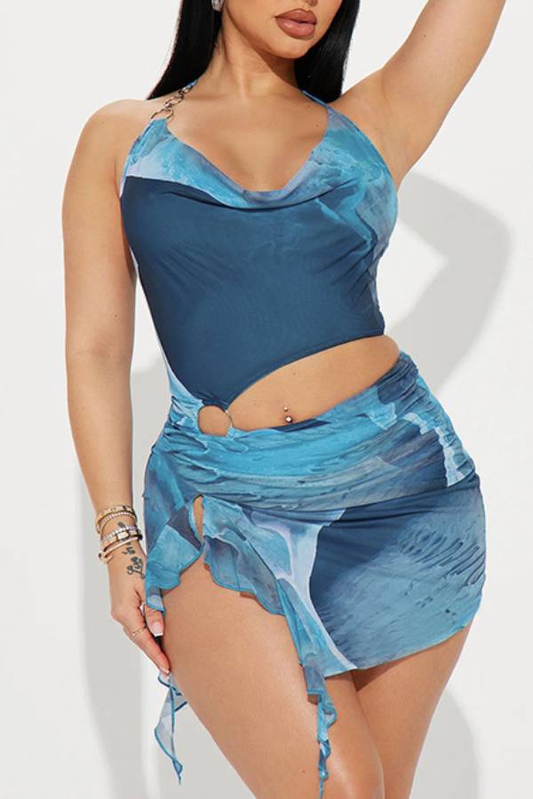 Printed halter-neck crop top and irregular hem skirt set