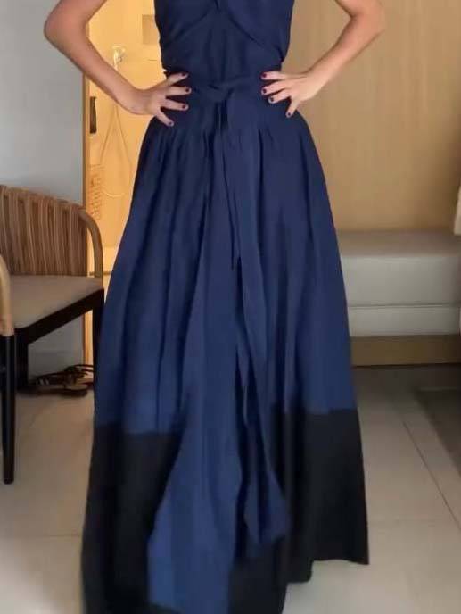 Jupe tailleur à lacets et col licou croisé